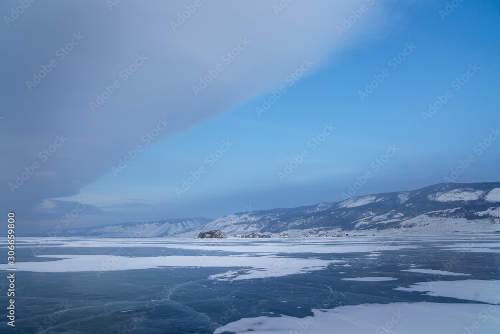 landscape with clouds and Baikal ice