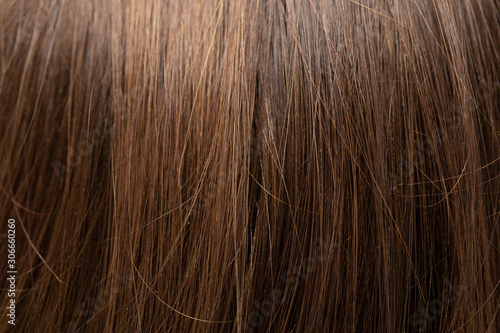 detail of a woman's brown and shiny straight hair