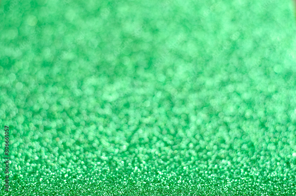 Sparkle emerald color shiny glitter texture background . Celebration decoration backdrop . Sparkle emerald color shiny glitter texture background . Celebration decoration backdrop .