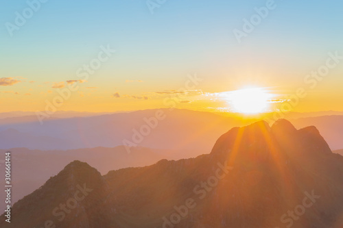 Sunset or evening time with blue sky and sunray or sunbeam at Doi Luang Chiang Dao, Chaingmai, Thailand.