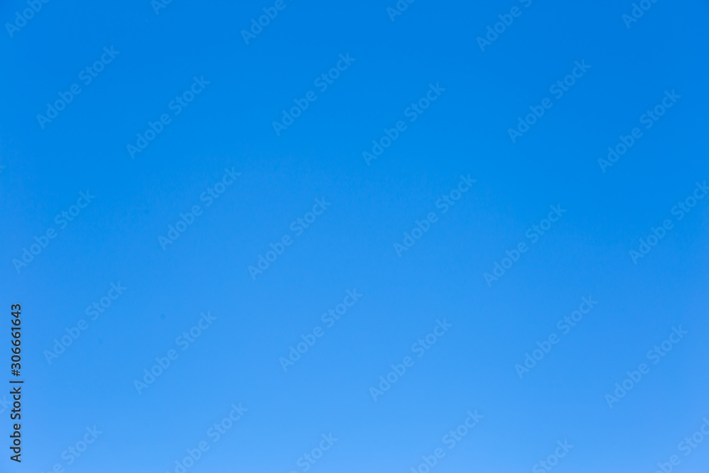 Real clear blue sky for background or backdrop.