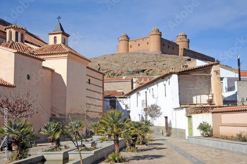 View of the castle, built 1509 - 1512, (Castillo de La Calahorra) and town, La calahorra, Granada Province, Andalucia, Spain