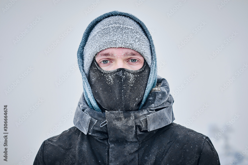 MAn's face covered with frost in winter MAn's face covered with frost in winter