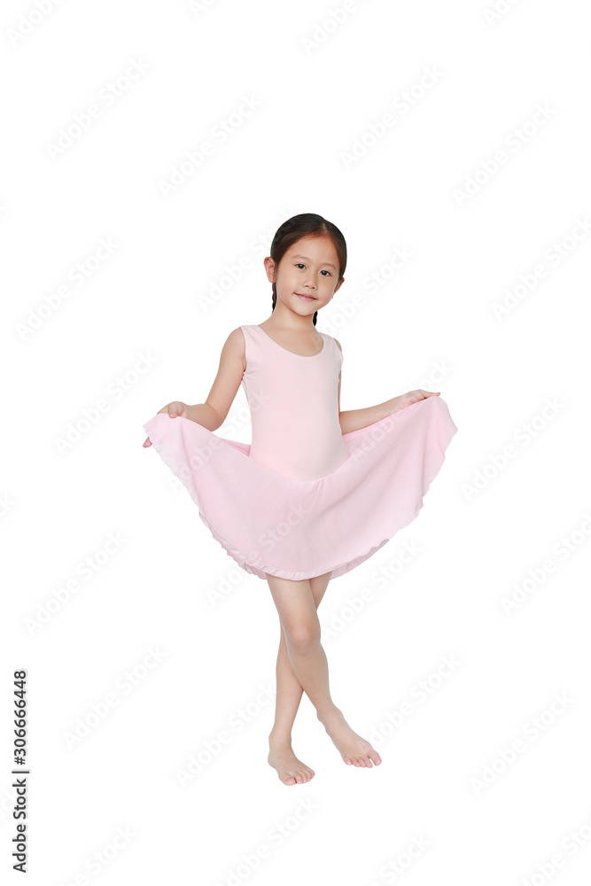 Beautiful little Asian child girl in pink tutu skirt isolated on white background. Children is studying ballet. Beautiful little Asian child girl in pink tutu skirt isolated on white background. Children is studying ballet.