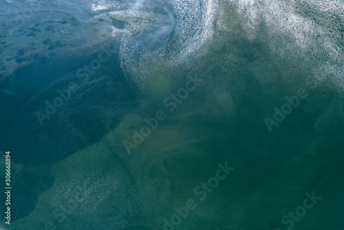 Abstract liquid green ocean background with bubbles. Fresh underwater backdrop © amixstudio