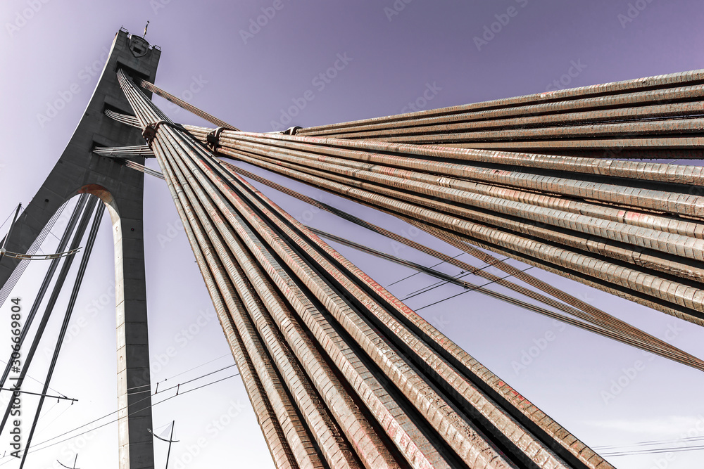 Obraz premium Road bridge construction - metal cables and reinforced concrete supports,