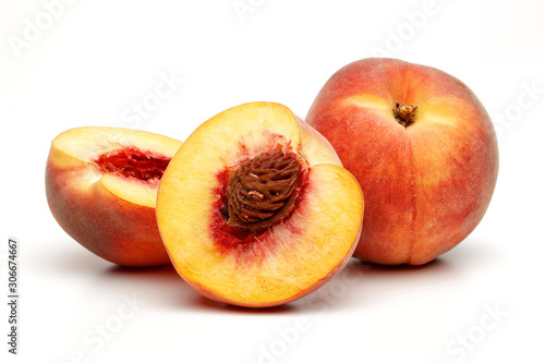 Ripe peach fruit with slice isolated