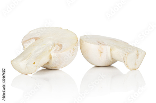 Group of two halves of fresh white champignon isolated on white background