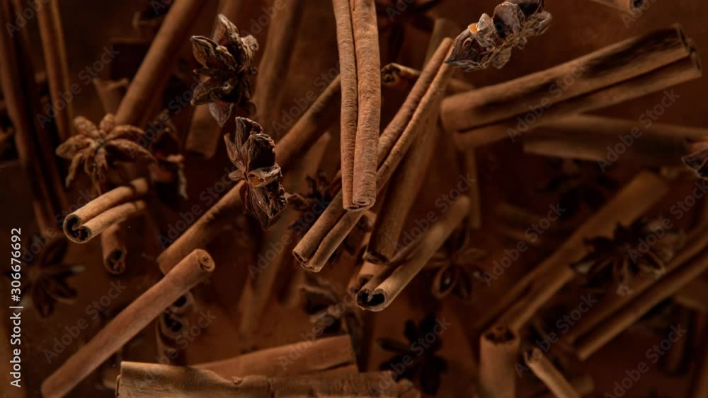 Super Slow Motion Shot of Cinnamon, Star anise and Powder Explosion on Black Background at 1000fps. Filmed on High Speed Cinema Camera in 4K Resolution Super Slow Motion Shot of Cinnamon, Star anise and Powder Explosion on Black Background at 1000fps. Filmed on High Speed Cinema Camera in 4K Resolution