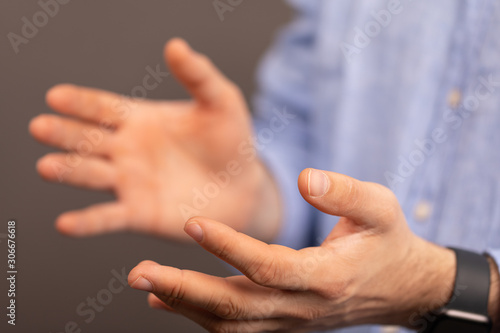 Businessman without head holding something without theme