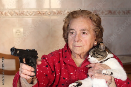 Hilarious lady protecting her cat  photo