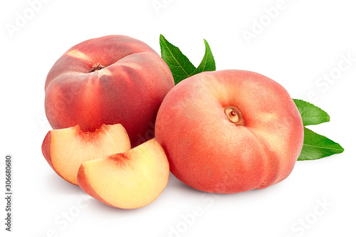 Ripe chinese flat peach fruit and slices with leaf isolated on white background