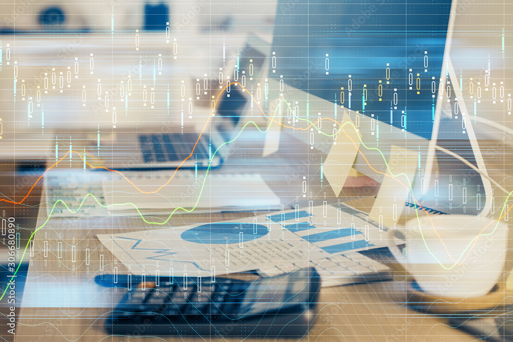Multi exposure of graph and financial info and work space with computer background. Concept of international online trading. Multi exposure of graph and financial info and work space with computer background. Concept of international online trading.