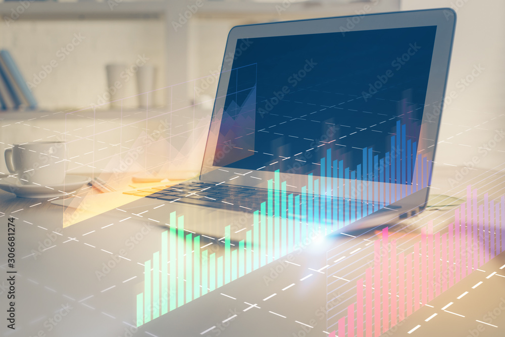 Forex Chart hologram on table with computer background. Multi exposure. Concept of financial markets. Forex Chart hologram on table with computer background. Multi exposure. Concept of financial markets.