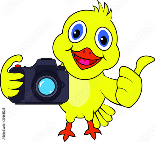 A nice yellow bird taking a picture snap using a modern digital camera show thumbs up