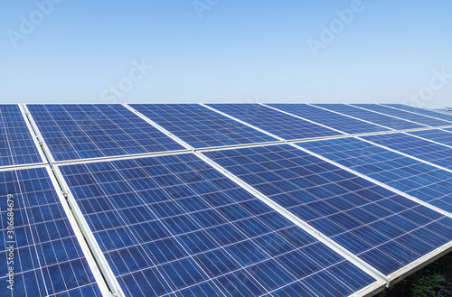  Close up rows array of solar cells or photovoltaics in solar power station convert light energy from the sun into electricity alternative renewable clean energy efficiency from the sun