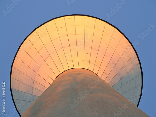 Under flying saucer shaped water tower at the time of sunrise early morning