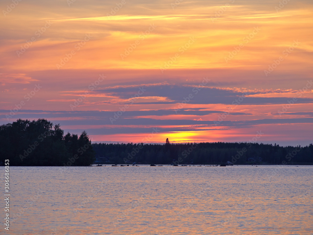Obraz premium Beautiful colourful sunset at the lake