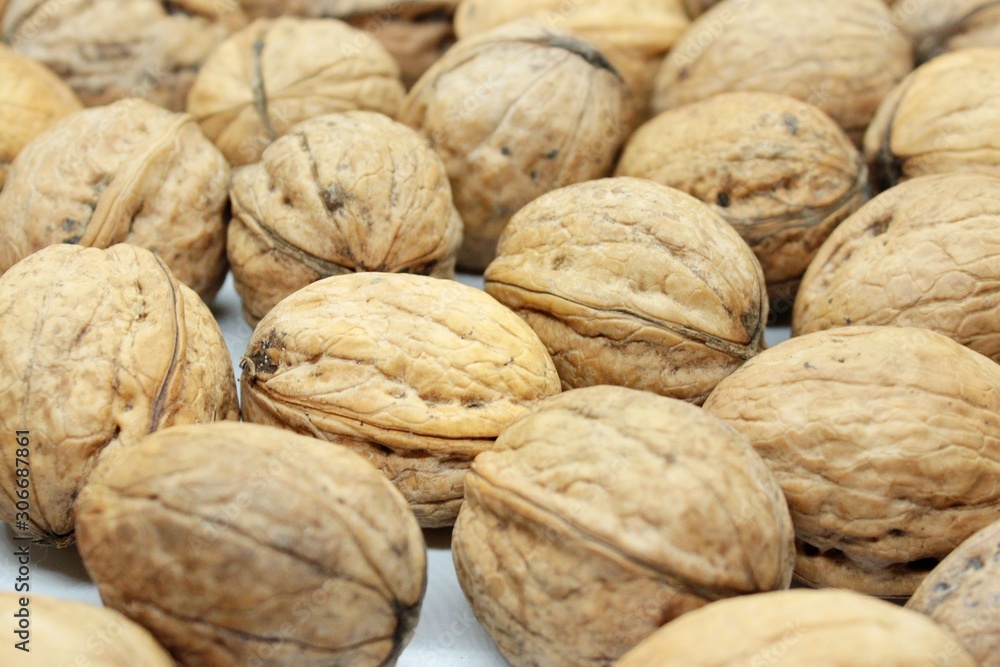 Tasty walnuts located on a white background Tasty walnuts located on a white background