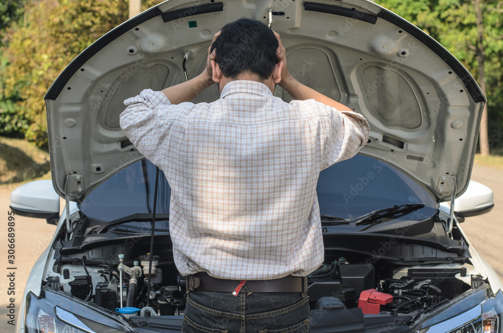 driver is stressed with the car that does not start. driver is stressed with the car that does not start.