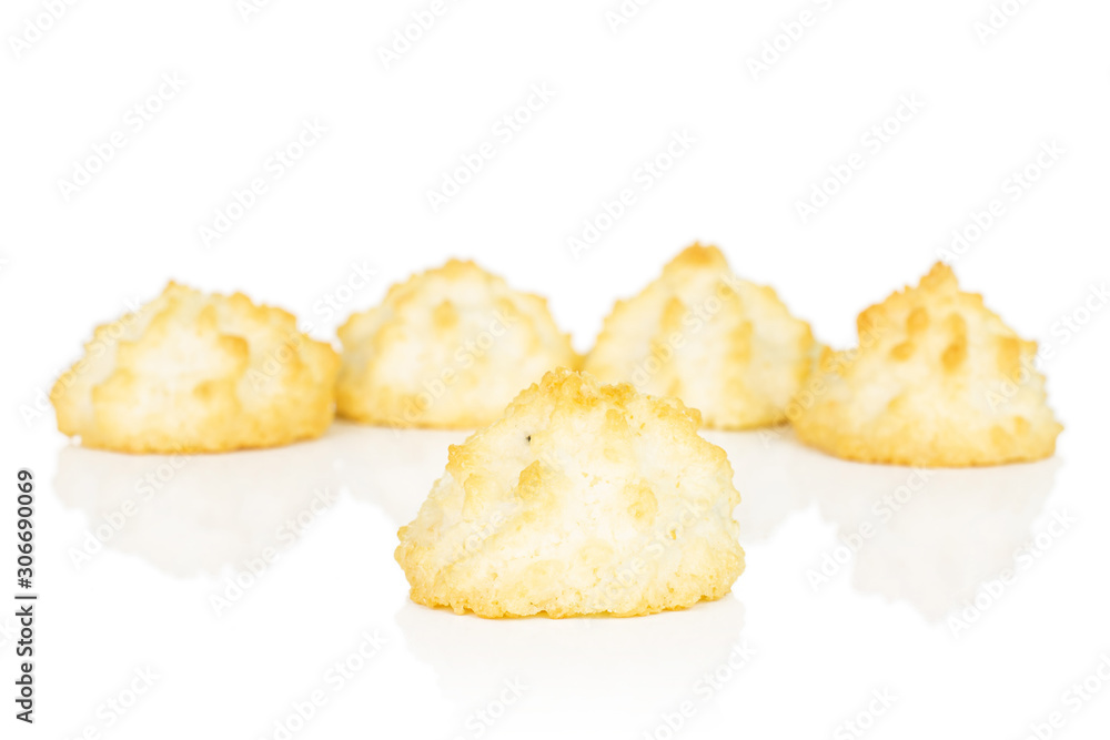 Group of five whole homemade golden coconut biscuit isolated on white background Group of five whole homemade golden coconut biscuit isolated on white background