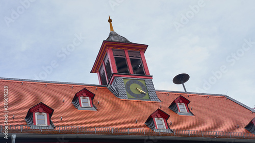 tower clock on red roof