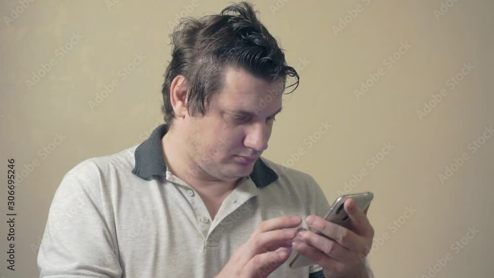 portrait of funny surprised middle aged emotional man with smartphone. portrait of funny surprised middle aged emotional man with smartphone.