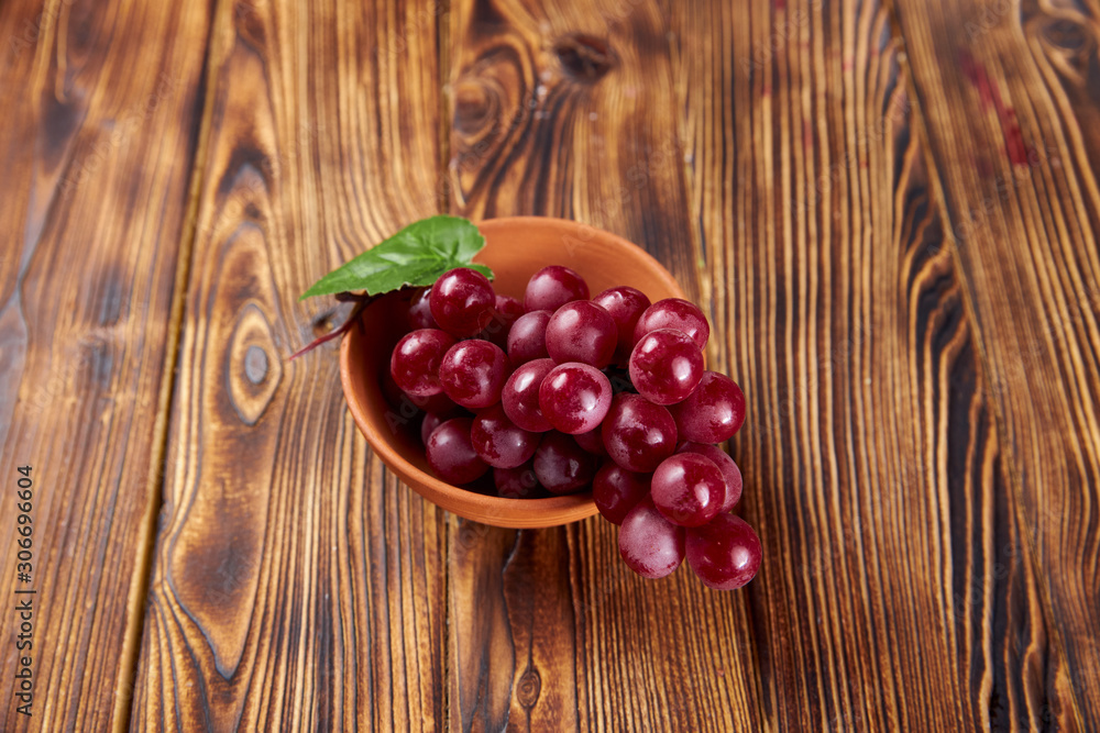 cherries in a bowl on wooden table cherries in a bowl on wooden table