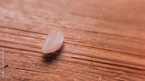 Rice on wooden table