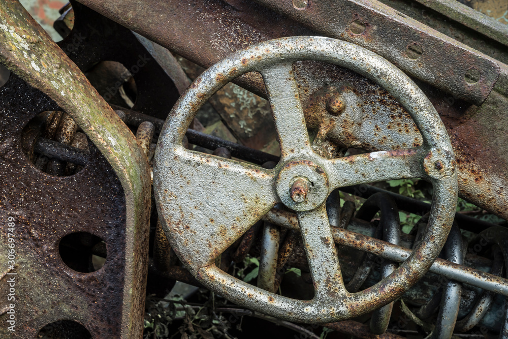 Adjustment wheel on a old gun.