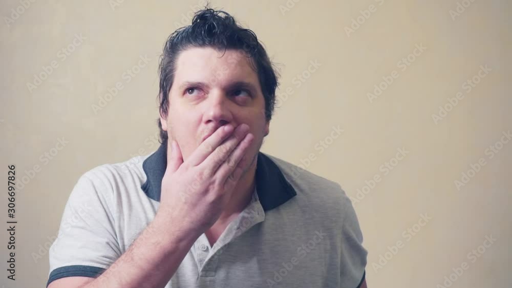 portrait of a funny surprised emotional middle aged man who is looking at the camera portrait of a funny surprised emotional middle aged man who is looking at the camera