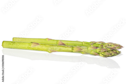 Group of two whole healthy green asparagus isolated on white background