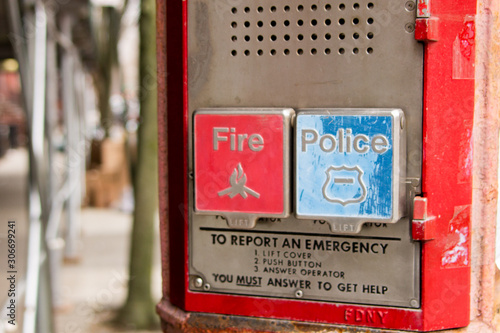 A public service totem to call the police and firefighters in Brooklyn, New York