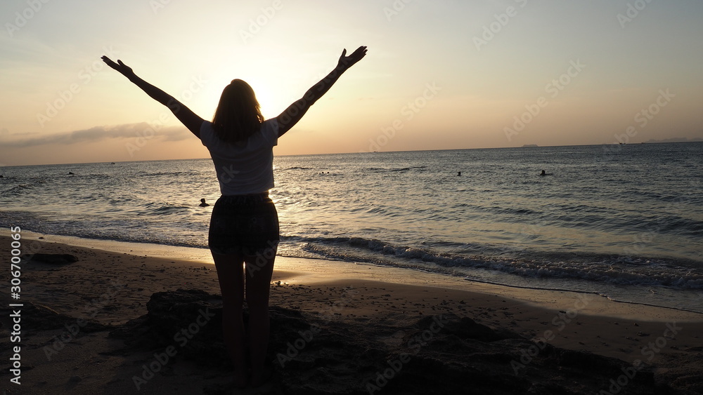 girl standing at the beach sunset thailand koh lanta girl standing at the beach sunset thailand koh lanta