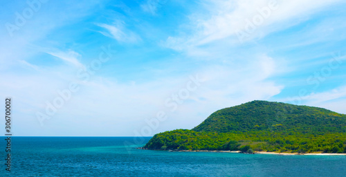 Fototapeta Naklejka Na Ścianę i Meble -  Beautiful beach and blue sea tropical green islands blue sky white cloud
