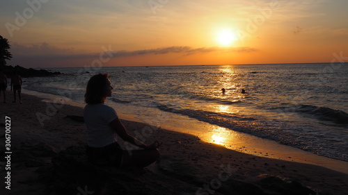 girl meditating practising yoga at the beach kimono thailand sunset © Magdalena Grzeszyk
