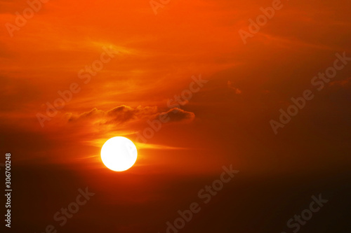 sunset on dark red orange sky back soft evening cloud over space2 photo