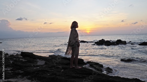 girl meditating practising yoga at the beach kimono thailand sunset © Magdalena Grzeszyk