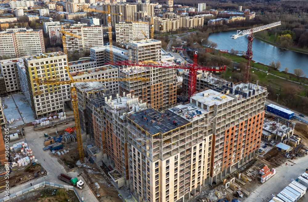 Fototapeta premium Aerial view of the construction of a residential quarter near the Park area