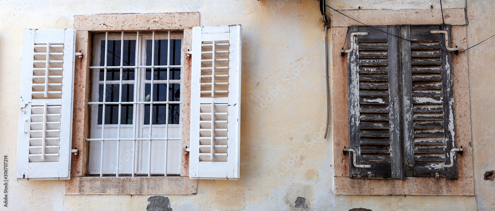 old Windows in stone wall, background, Perast, Montenegro