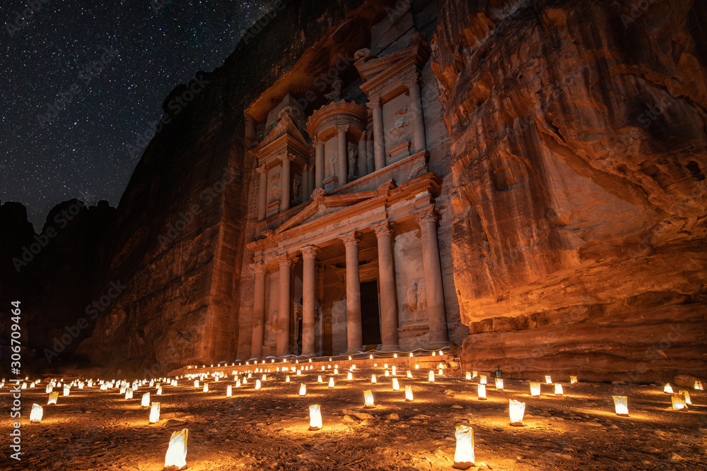 The treasury in Petra, Jordan with beautiful candles and stars.