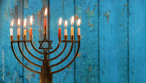 jewish holiday Hanukkah with menorah traditional candelabra photo