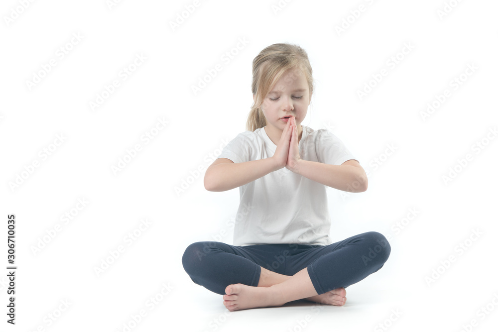 little girl sitting in lotus position isolate little girl sitting in lotus position isolate