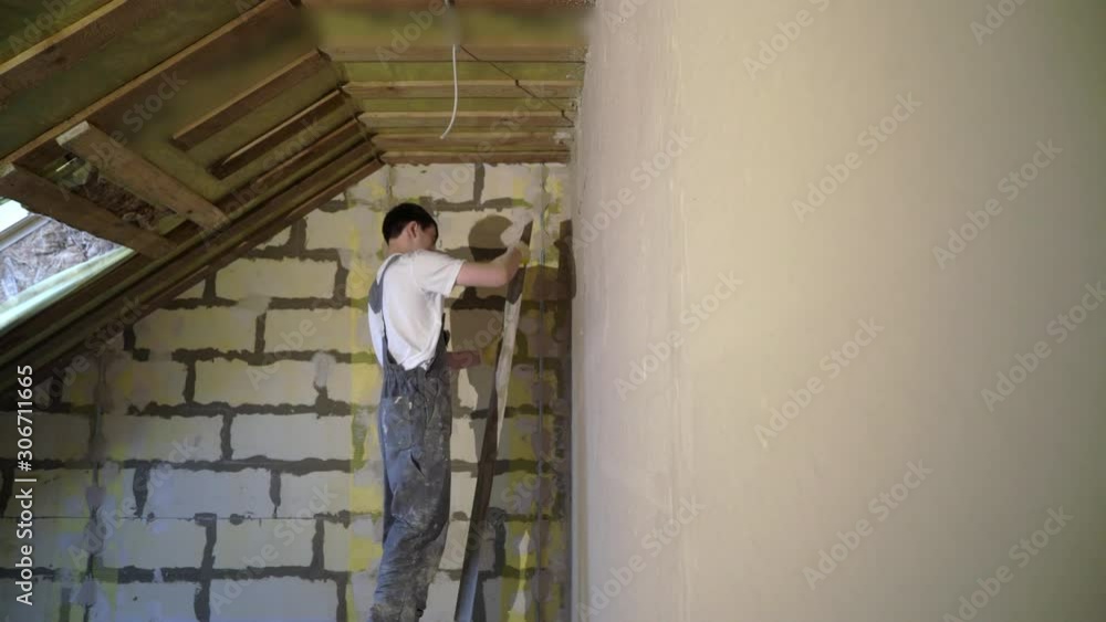 custom made wallpaper toronto digitalPlastering mortar machine. Automatic plaster. Repairing or renovating house or apartment. Builder at construction professional