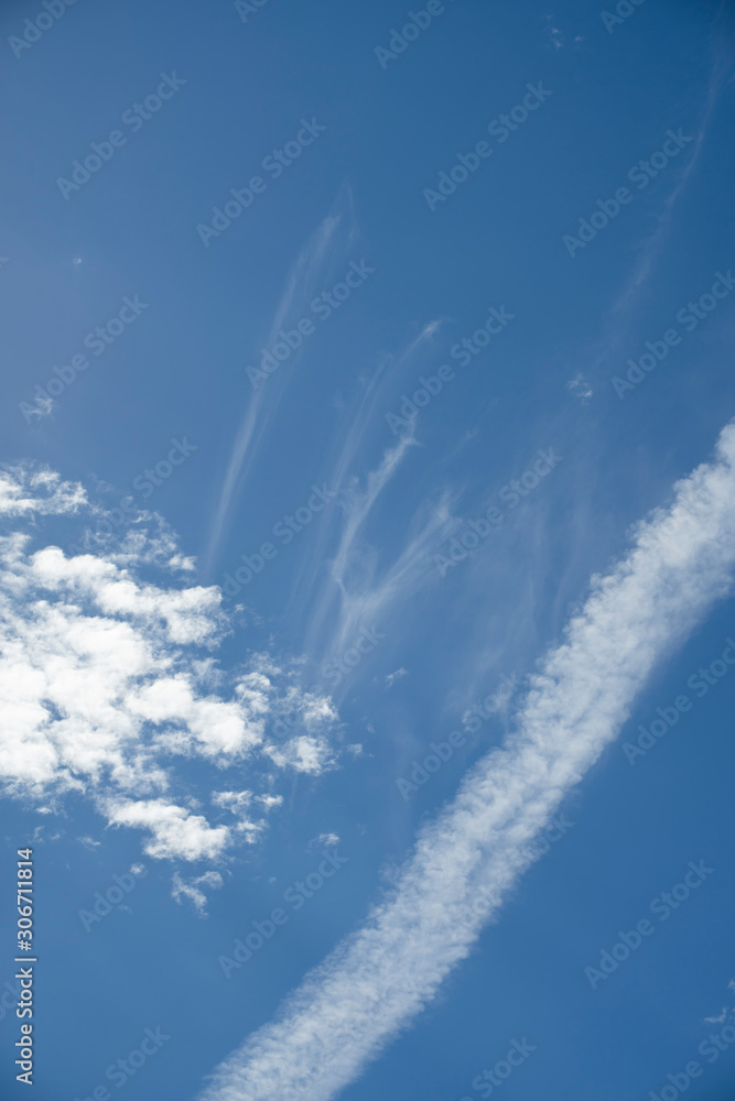 Nature background with blue sky and white clouds in Vertical frame Nature background with blue sky and white clouds in Vertical frame