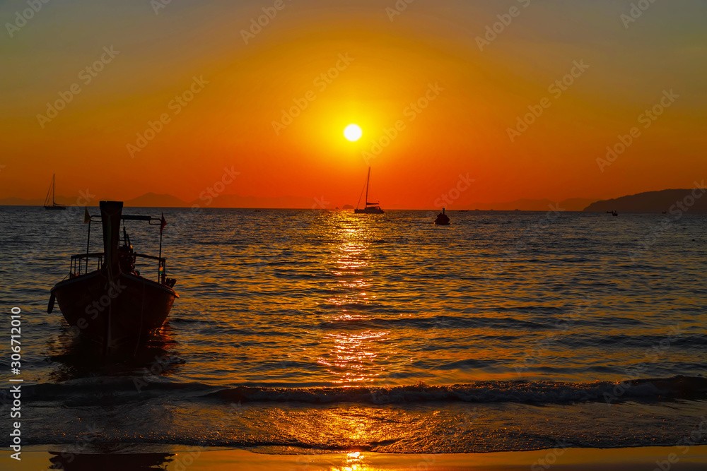 Long tail boat sunset sky dusk golden hour clouds sun