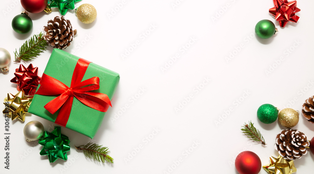 Christmas frame with gift and ornaments isolated on white Christmas frame with gift and ornaments isolated on white