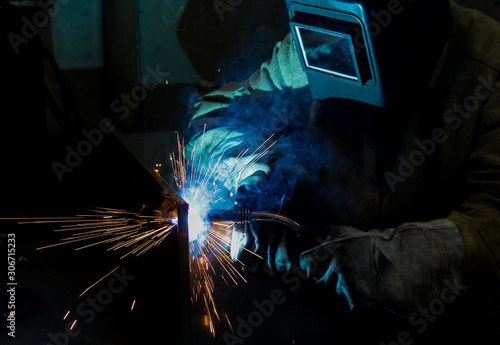 welder work, welding sparks, workshop production