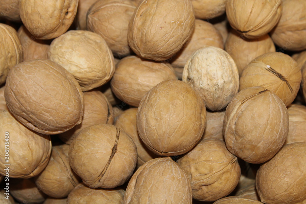 walnuts on wooden background nuts