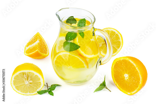Glass jug with lemon water (or alcohol), slices and mint